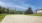 volleyball court surrounded by green turf